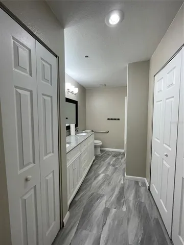 a view of an empty room with a window