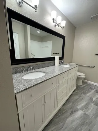 a view of room with window and ceiling fan