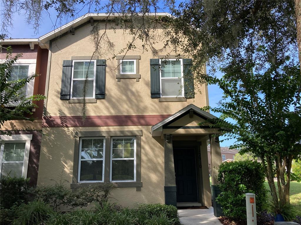 a front view of a house with yard