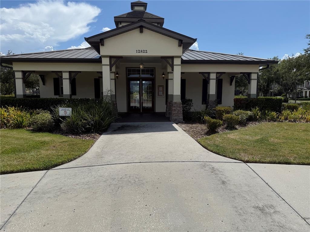 12910 Calderdale Avenue Windermere, FL 34786 - Photo 21 of 24 front view of house with a yard
