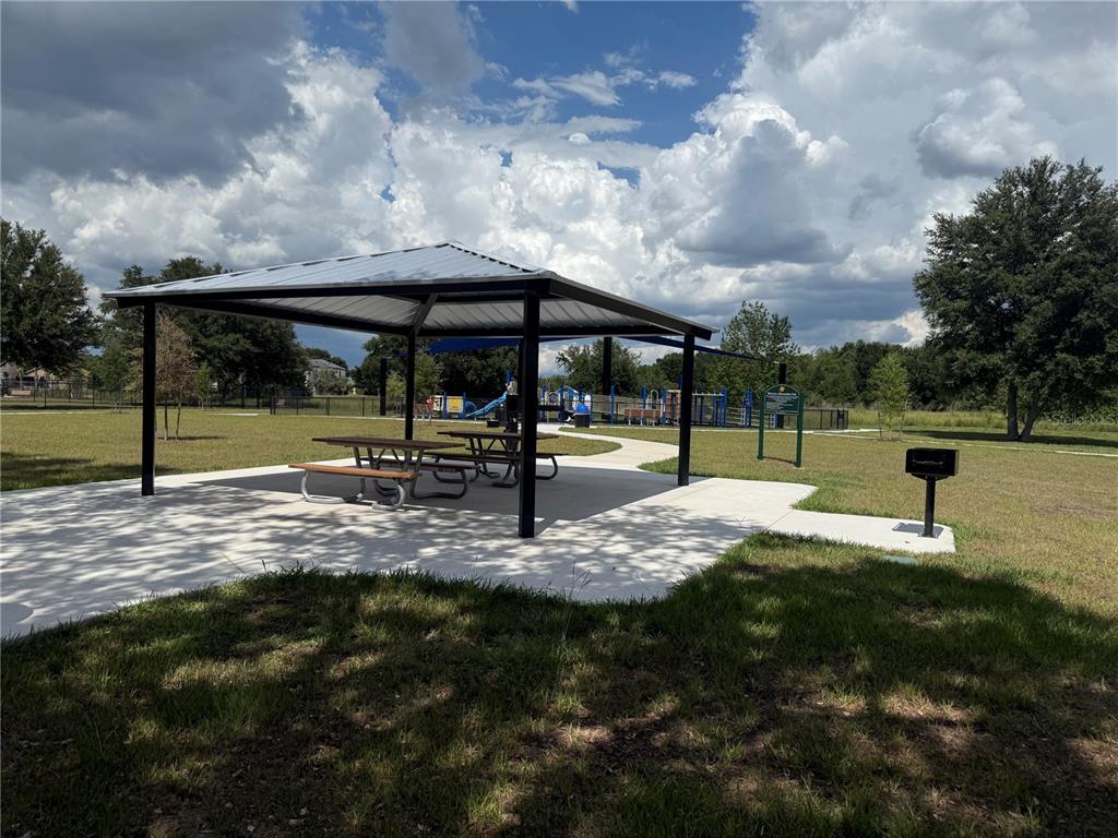 12910 Calderdale Avenue Windermere, FL 34786 - Photo 22 of 24 a view of a playground with green space