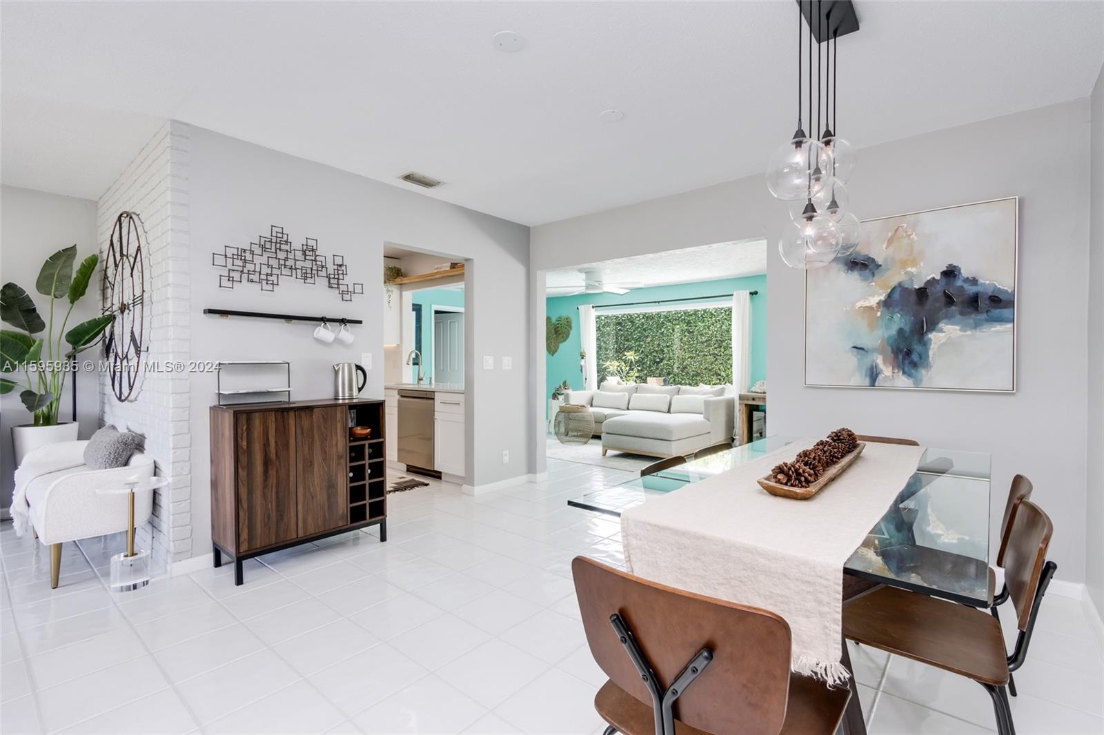 20 Burning Tree Lane Boca Raton, FL 33431 - Photo 23 of 64 a view of a dining room with furniture window and wooden floor