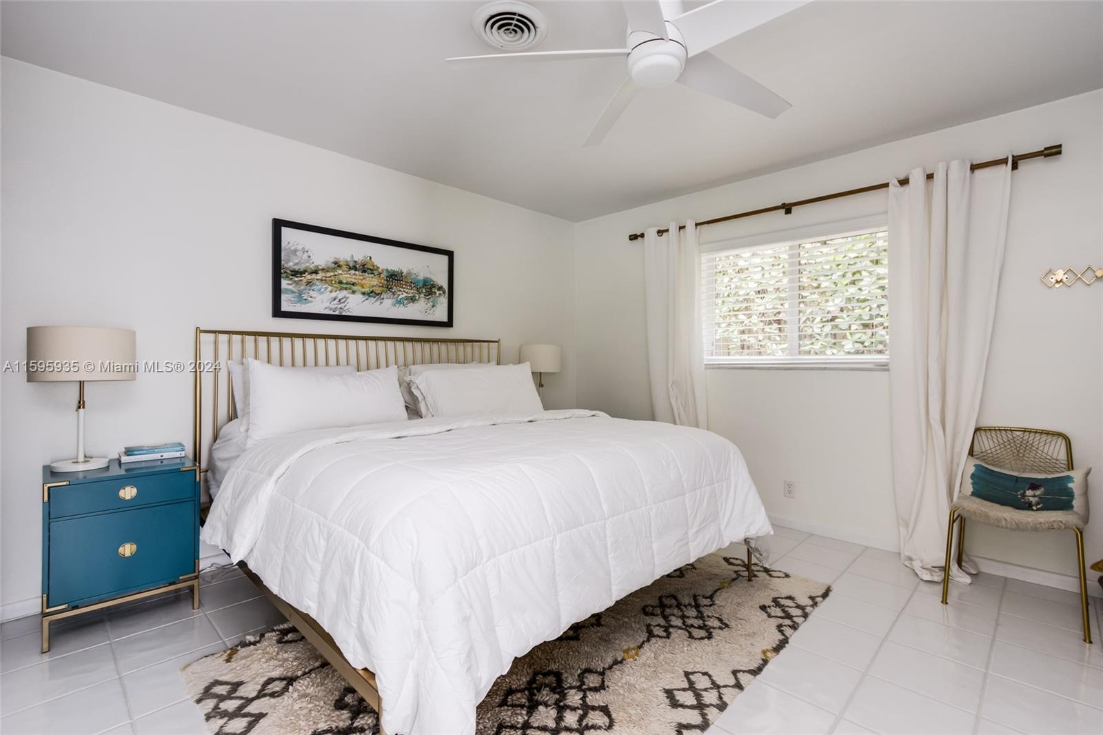 20 Burning Tree Lane Boca Raton, FL 33431 - Photo 28 of 64 a bedroom with a bed and a painting on the wall