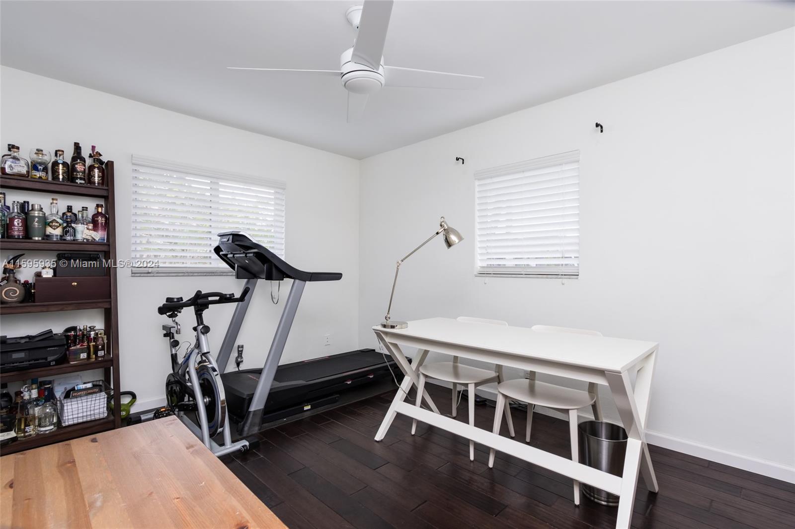 20 Burning Tree Lane Boca Raton, FL 33431 - Photo 42 of 64 a room with gym equipment and a window