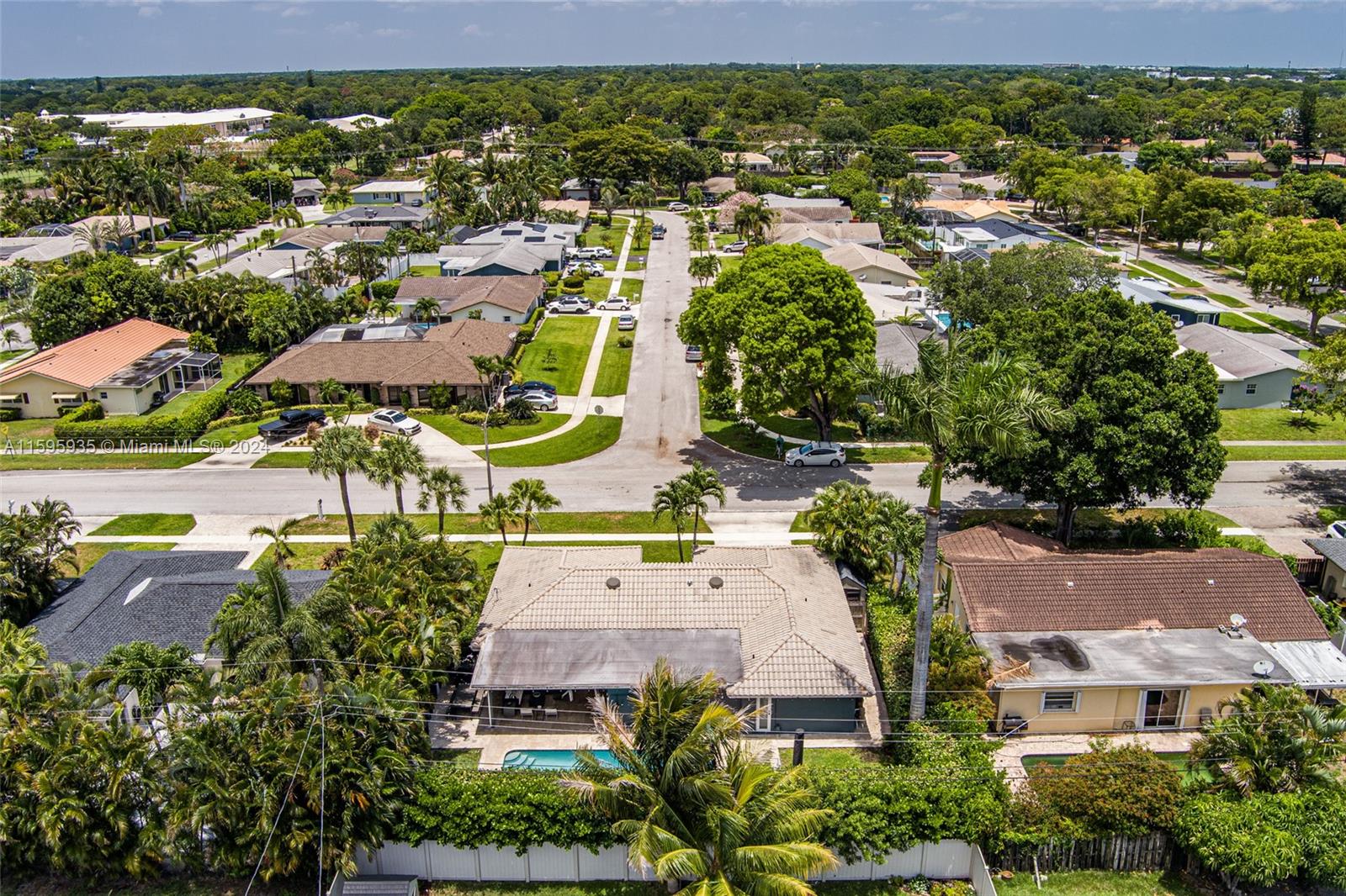 20 Burning Tree Lane Boca Raton, FL 33431 - Photo 54 of 64 an aerial view of residential houses with outdoor space and river