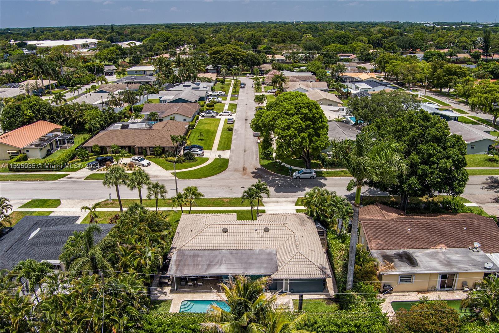 20 Burning Tree Lane Boca Raton, FL 33431 - Photo 55 of 64 an aerial view of residential houses with outdoor space and parking