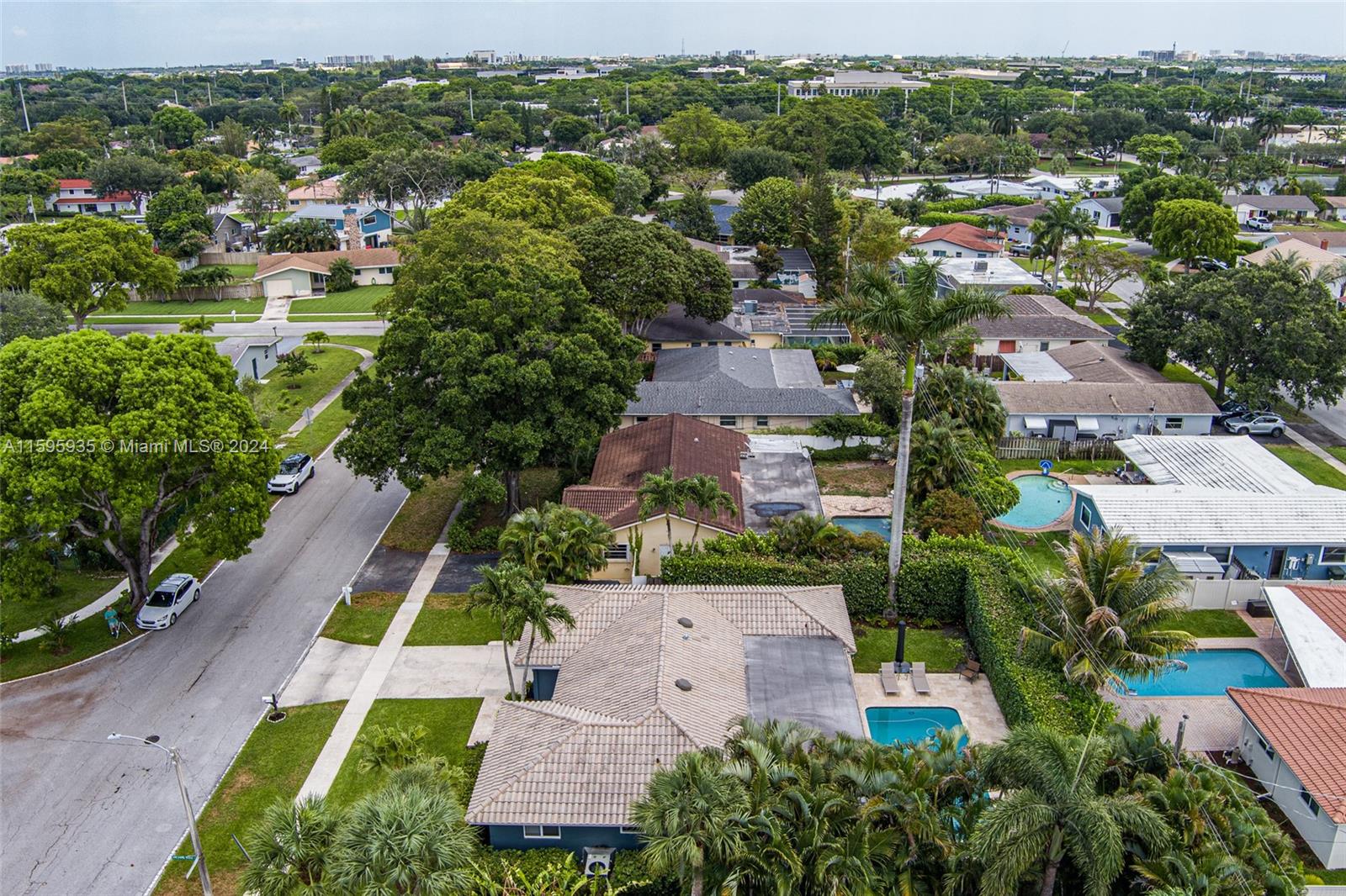 20 Burning Tree Lane Boca Raton, FL 33431 - Photo 59 of 64 an aerial view of multiple houses with yard
