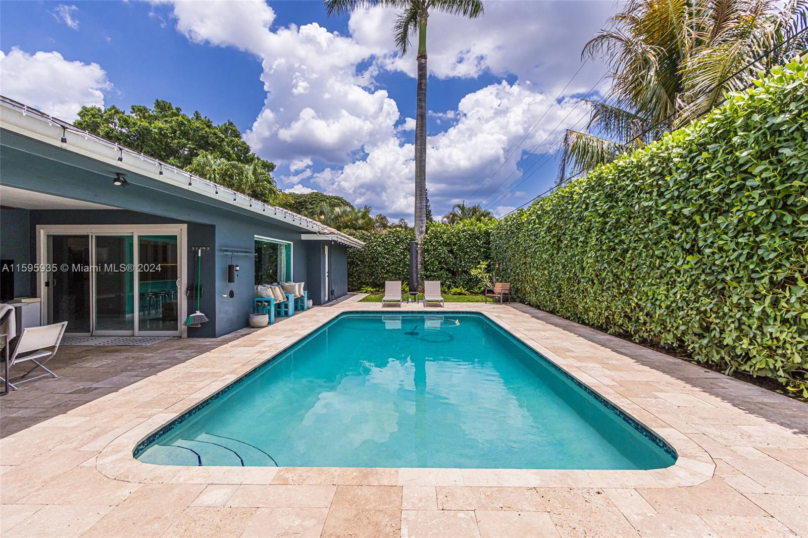 20 Burning Tree Lane Boca Raton, FL 33431 - Photo 9 of 64 a swimming pool with outdoor seating and yard