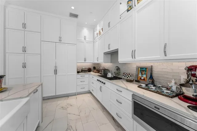 a bed room with furniture and a window