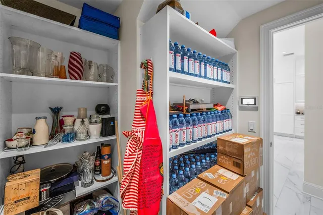 a room with a dresser and a mirror