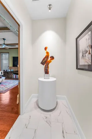 a bath room with a sink and a mirror
