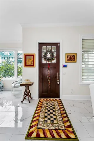 a bedroom with furniture and a fireplace