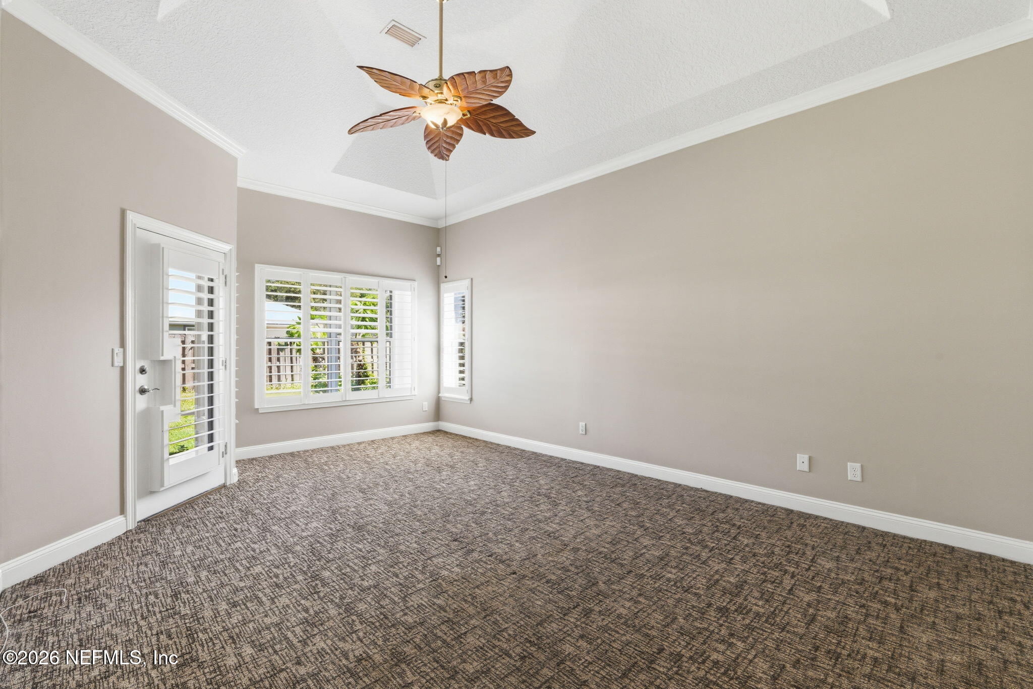 1600 Spring Water Court Fleming Island, FL 32003 - Photo 47 of 85 an empty room with a empty space and a ceiling fan