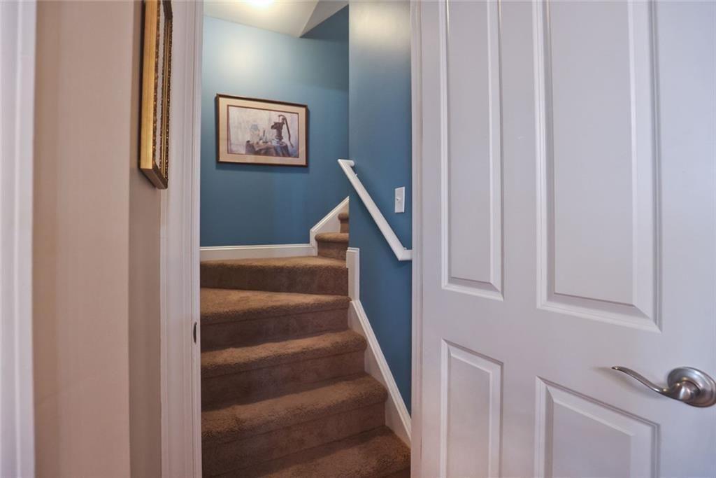 42 Crooked Branch Road Clayton, GA 30525 - Photo 31 of 48 a view of staircase with white walls and a window