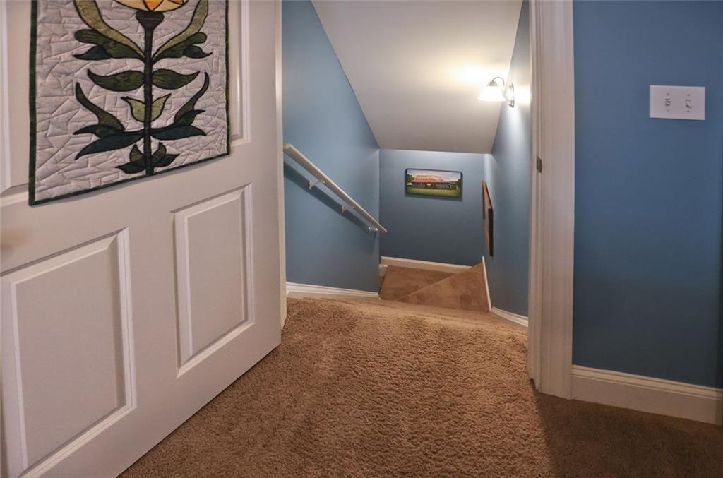42 Crooked Branch Road Clayton, GA 30525 - Photo 32 of 48 a view of a hallway with wooden floor