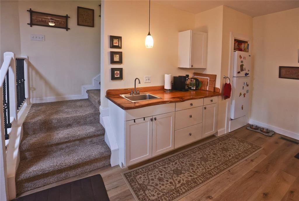 42 Crooked Branch Road Clayton, GA 30525 - Photo 36 of 48 a bathroom with a sink and a mirror