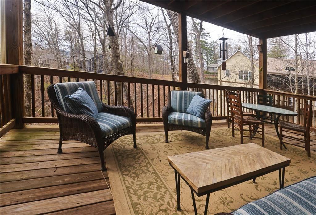 42 Crooked Branch Road Clayton, GA 30525 - Photo 45 of 48 a view of a chairs and table on the deck