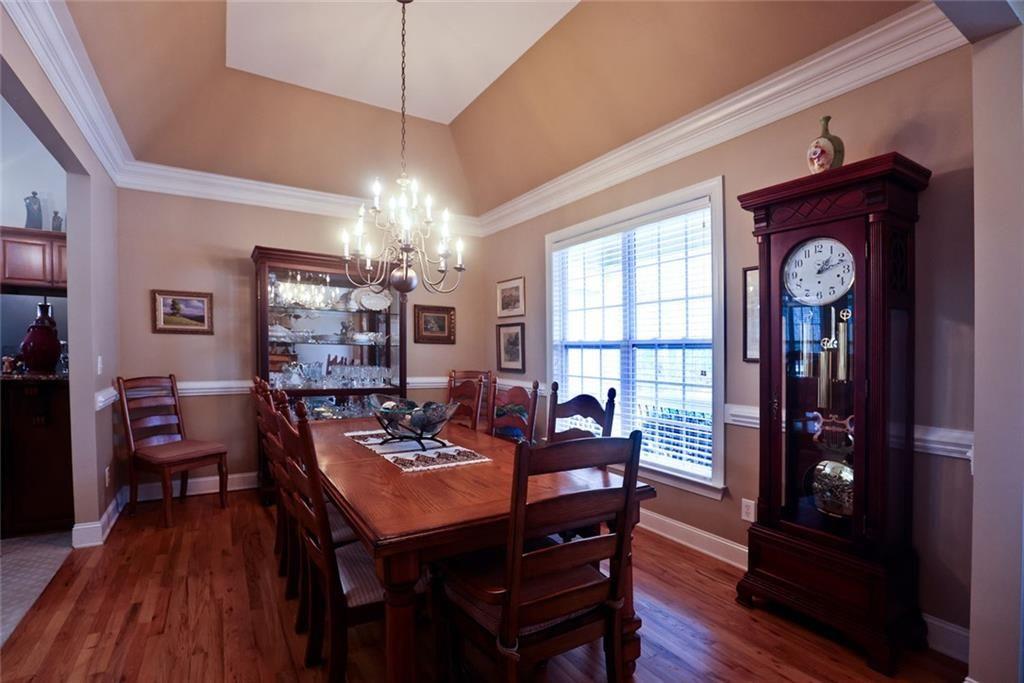 42 Crooked Branch Road Clayton, GA 30525 - Photo 6 of 48 a view of a dining room with furniture window and wooden floor