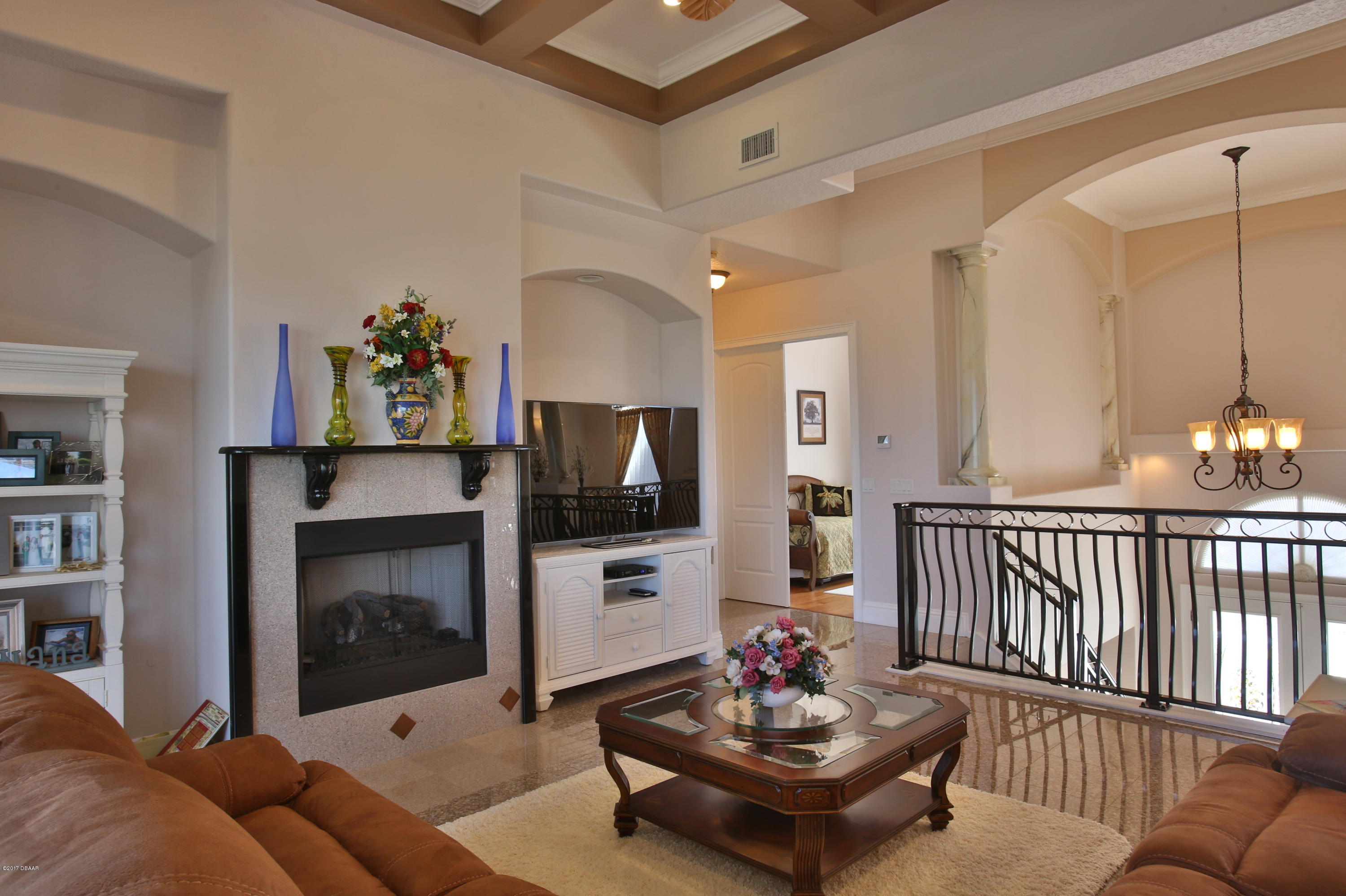3 Mar Azul South Ponce Inlet, FL 32127 - Photo 8 of 36 a living room with furniture a fireplace and a flat screen tv