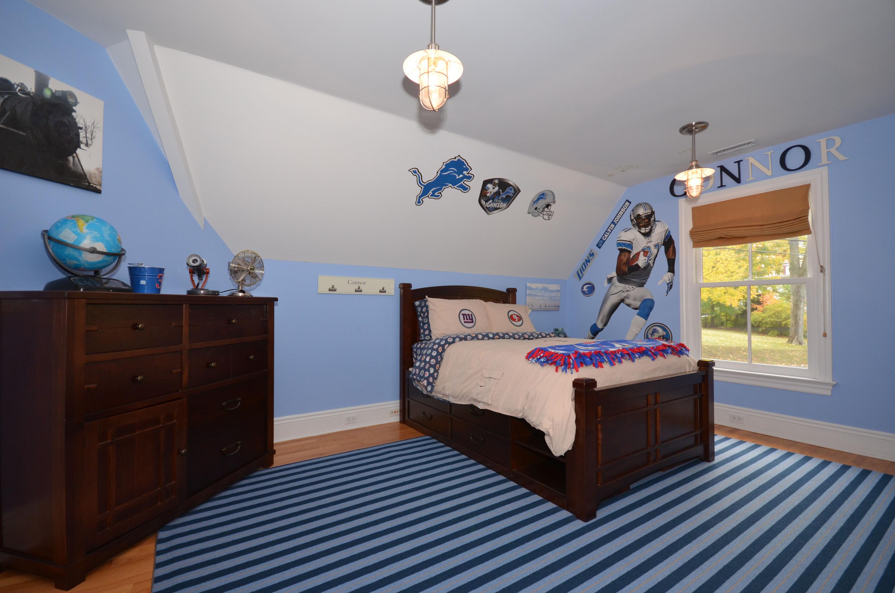 45 Brookside Road Darien, CT 06820 - Photo 17 of 24 a bedroom with a bed and dresser with window