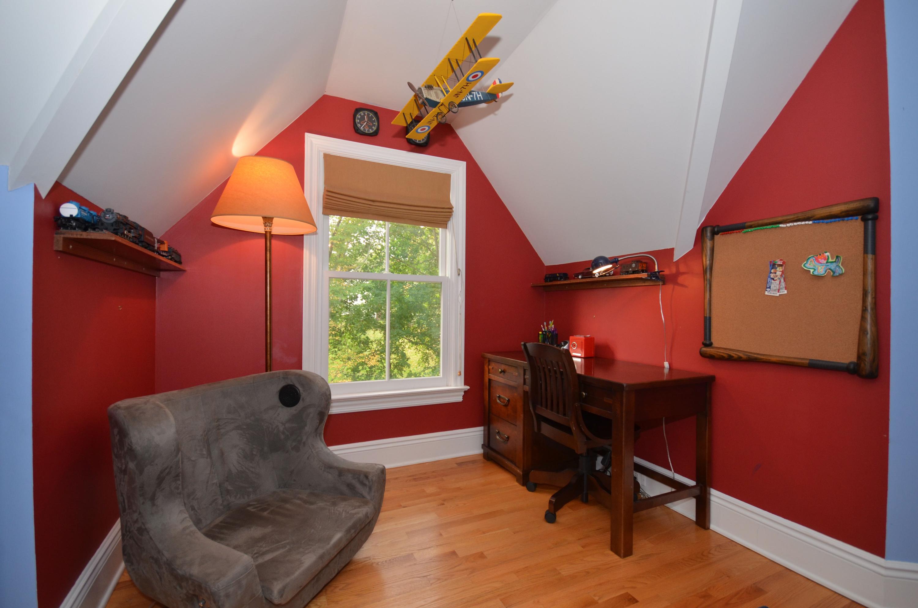 45 Brookside Road Darien, CT 06820 - Photo 18 of 24 a livingroom with workspace and a window