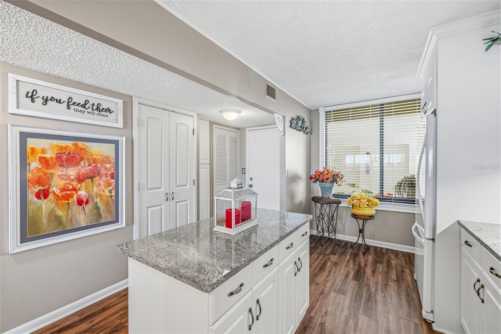9425 Blind Pass Road, Unit 705 St. Pete Beach, FL 33706 - Photo 8 of 66 a very nice looking room with a large window
