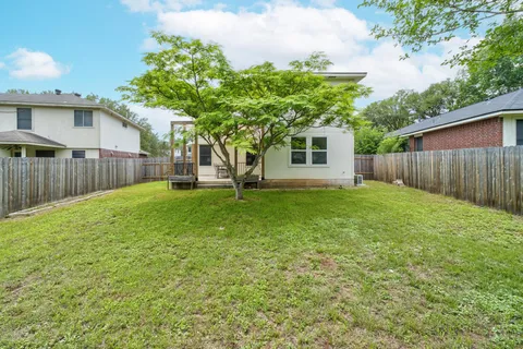 a house view with a garden space