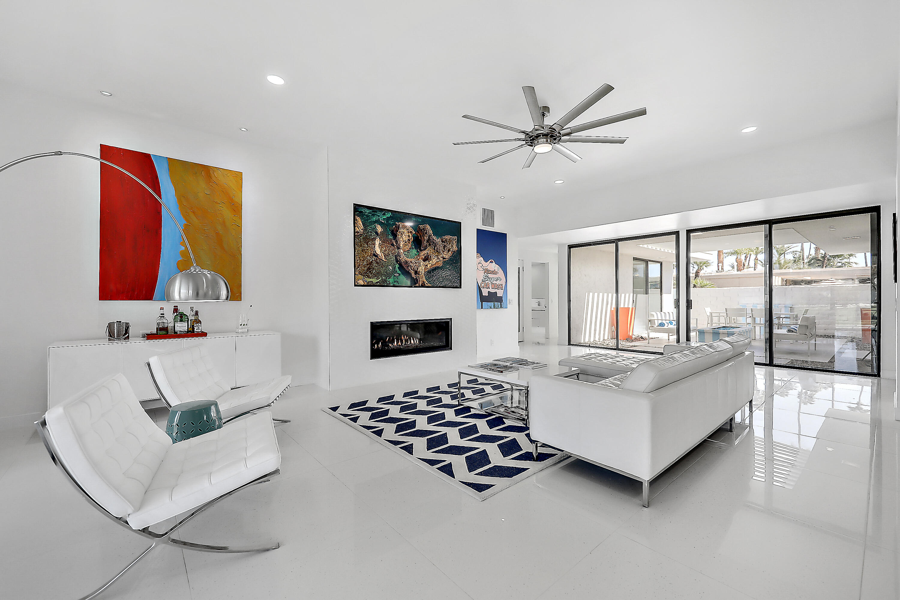 45765 Hopi Road Indian Wells, CA 92210 - Photo 11 of 39 a living room with furniture and a fireplace