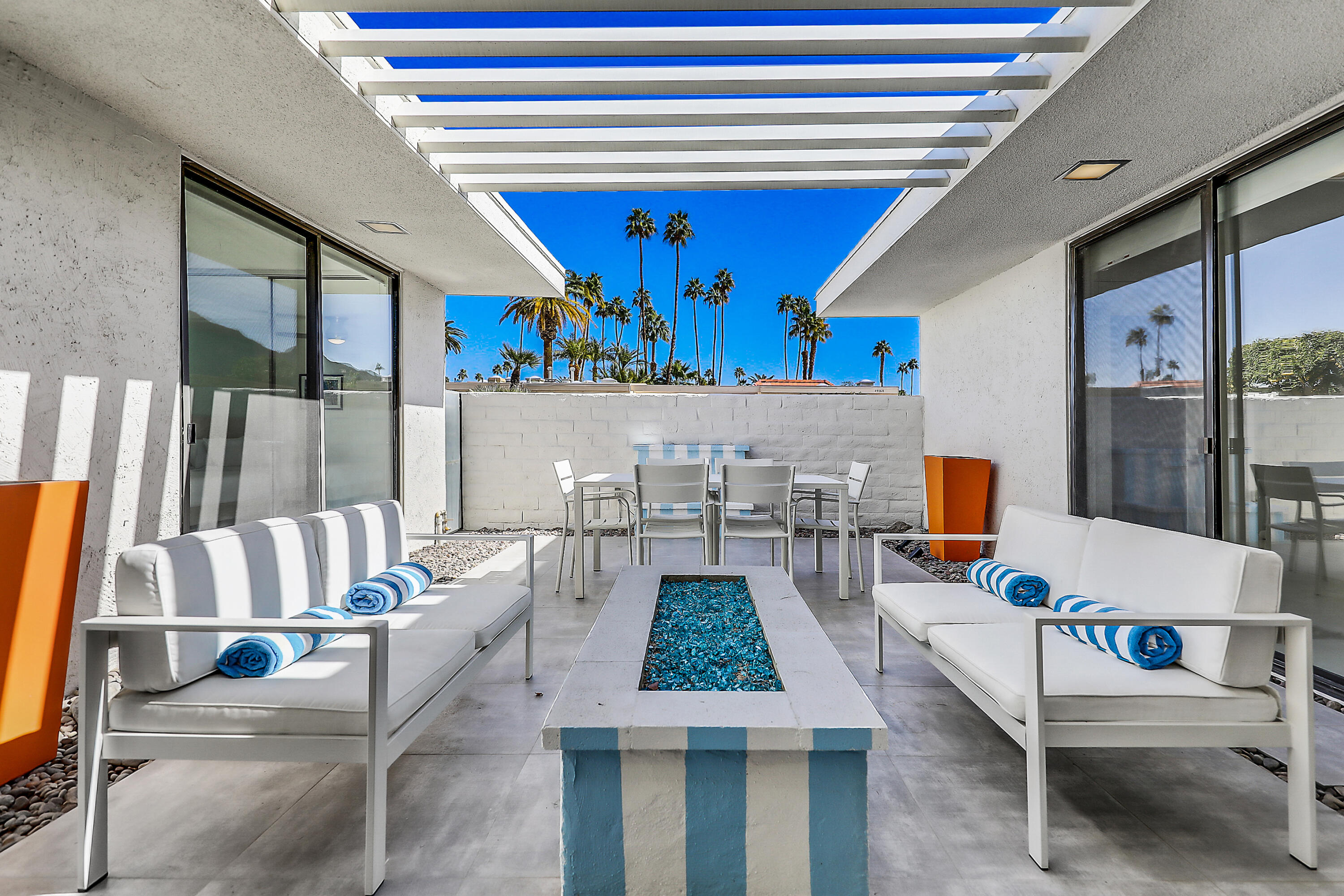 45765 Hopi Road Indian Wells, CA 92210 - Photo 12 of 39 a living room with furniture and a large window
