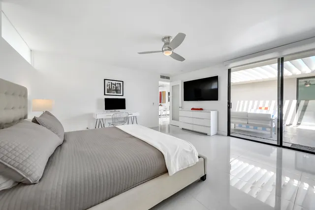 a bathroom with a double vanity sink mirror and shower