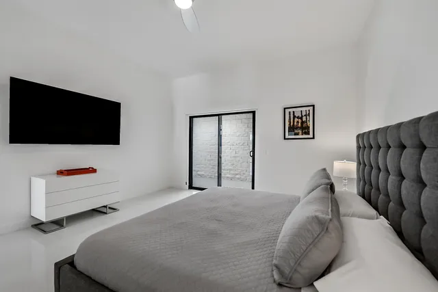 a bathroom with a shower toilet sink and mirror