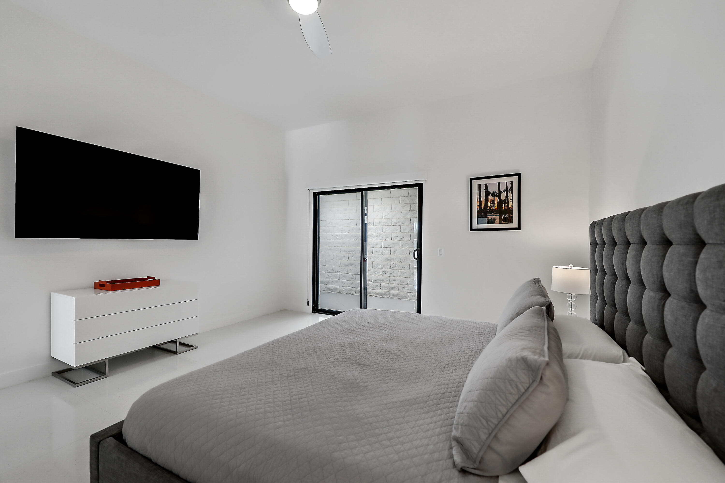 45765 Hopi Road Indian Wells, CA 92210 - Photo 24 of 39 a living room with furniture and a flat screen tv