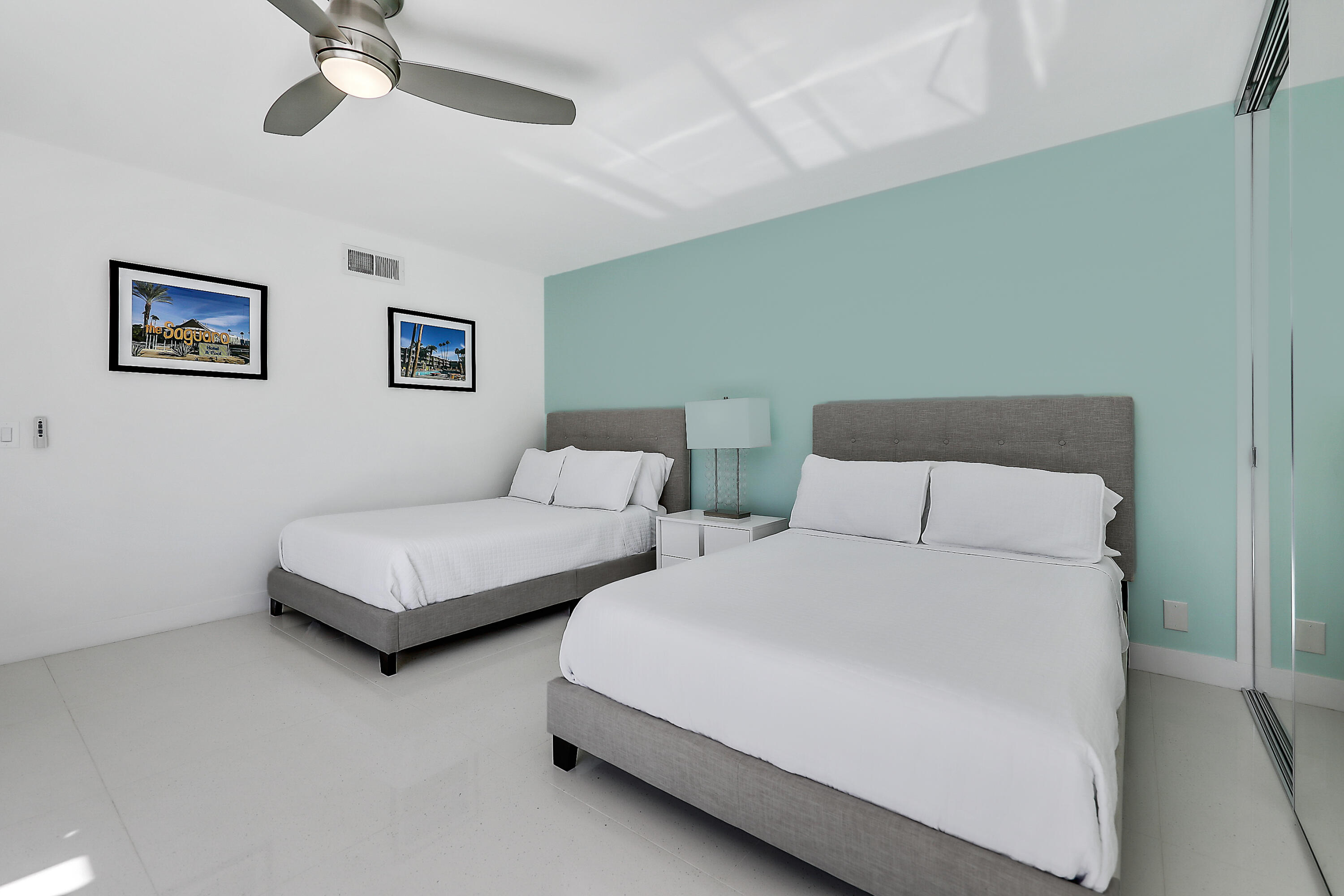 45765 Hopi Road Indian Wells, CA 92210 - Photo 27 of 39 a bedroom with two beds and painting on the wall