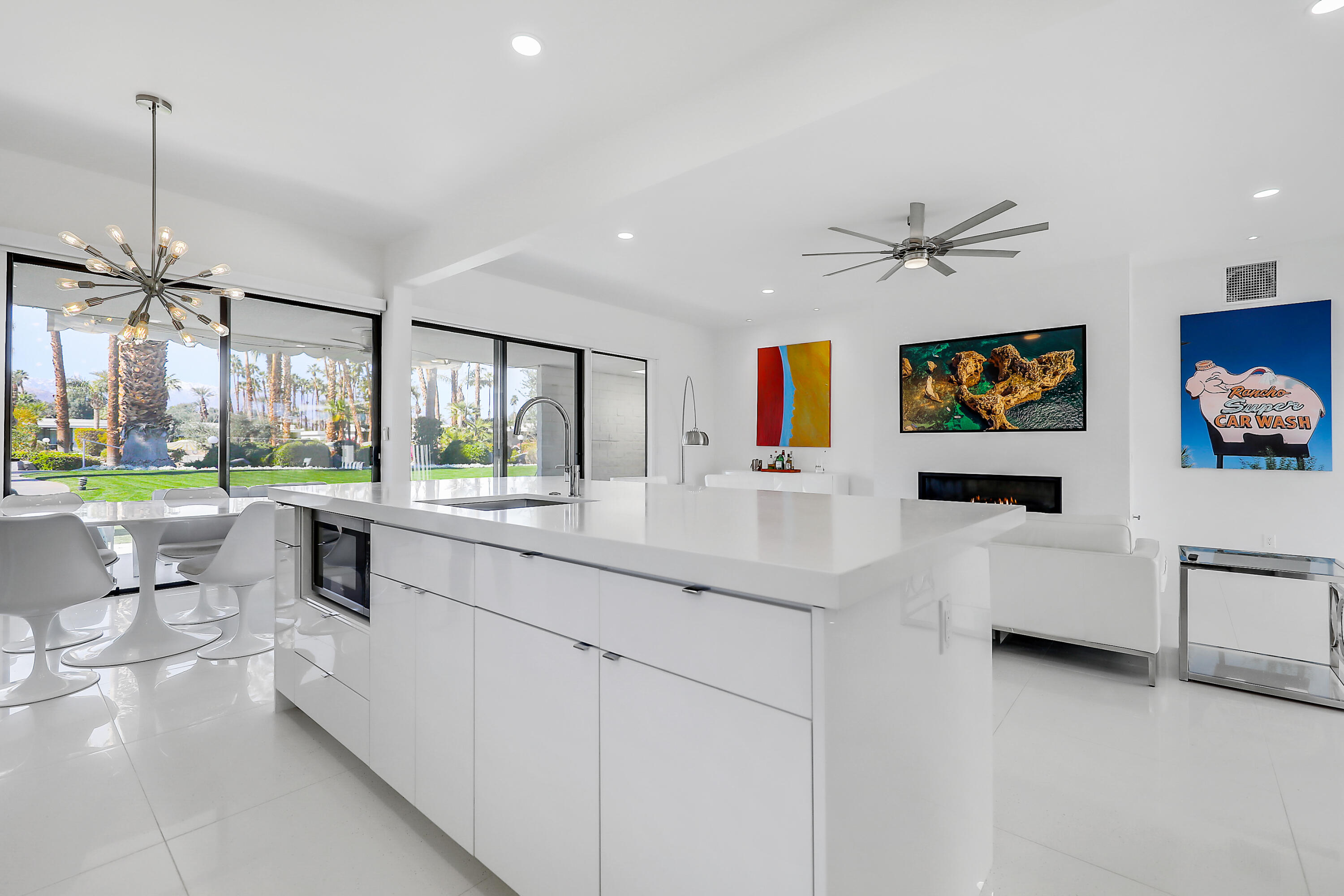 45765 Hopi Road Indian Wells, CA 92210 - Photo 3 of 39 a kitchen with stainless steel appliances kitchen island granite countertop a sink and cabinets