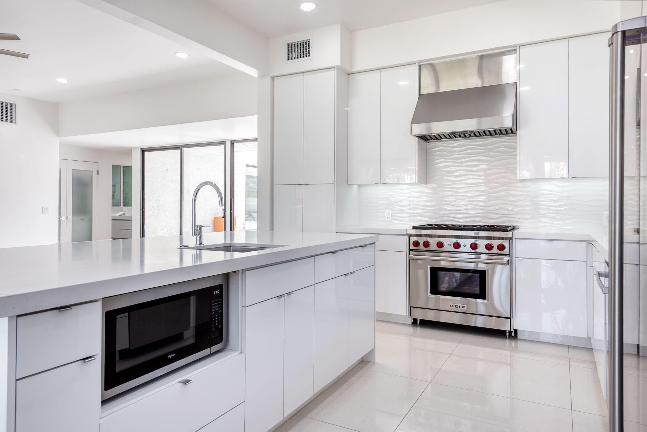 45765 Hopi Road Indian Wells, CA 92210 - Photo 5 of 39 a kitchen with stainless steel appliances a stove and a sink