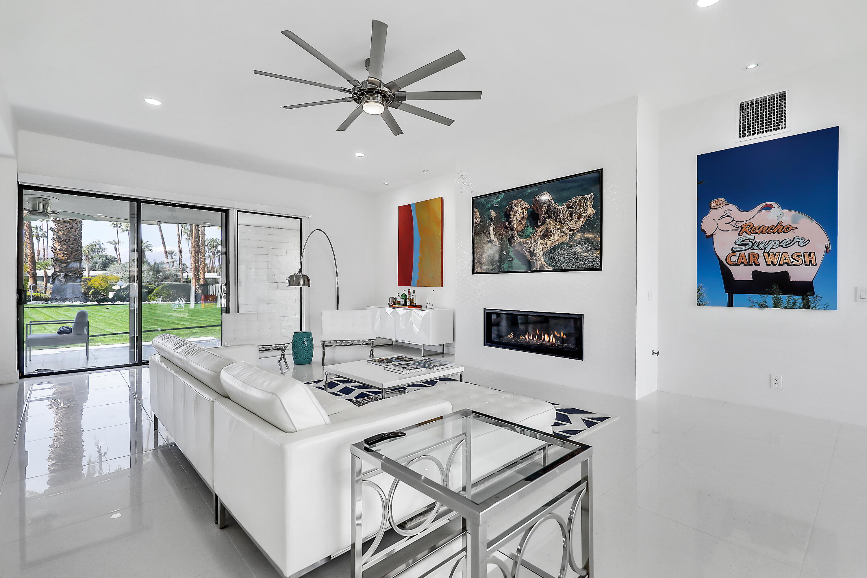45765 Hopi Road Indian Wells, CA 92210 - Photo 10 of 39 a living room with furniture and a fireplace