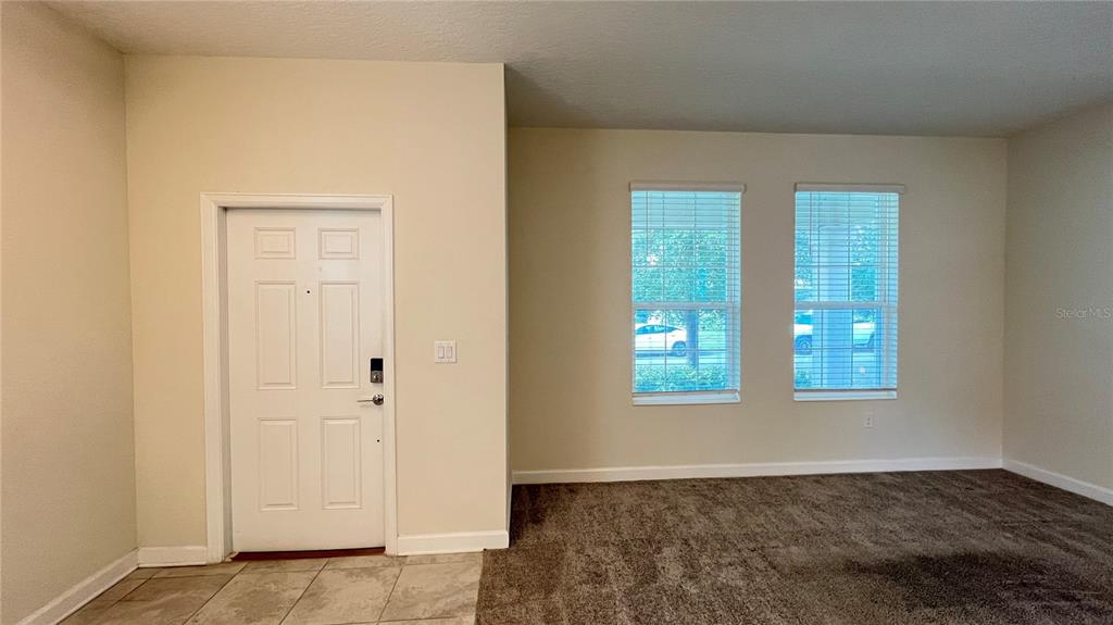 15216 Chapter Way Winter Garden, FL 34787 - Photo 15 of 53 an empty room with windows