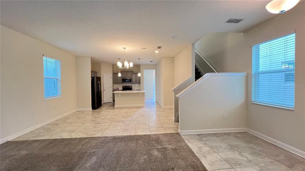 15216 Chapter Way Winter Garden, FL 34787 - Photo 19 of 53 a view of a hallway with stairs