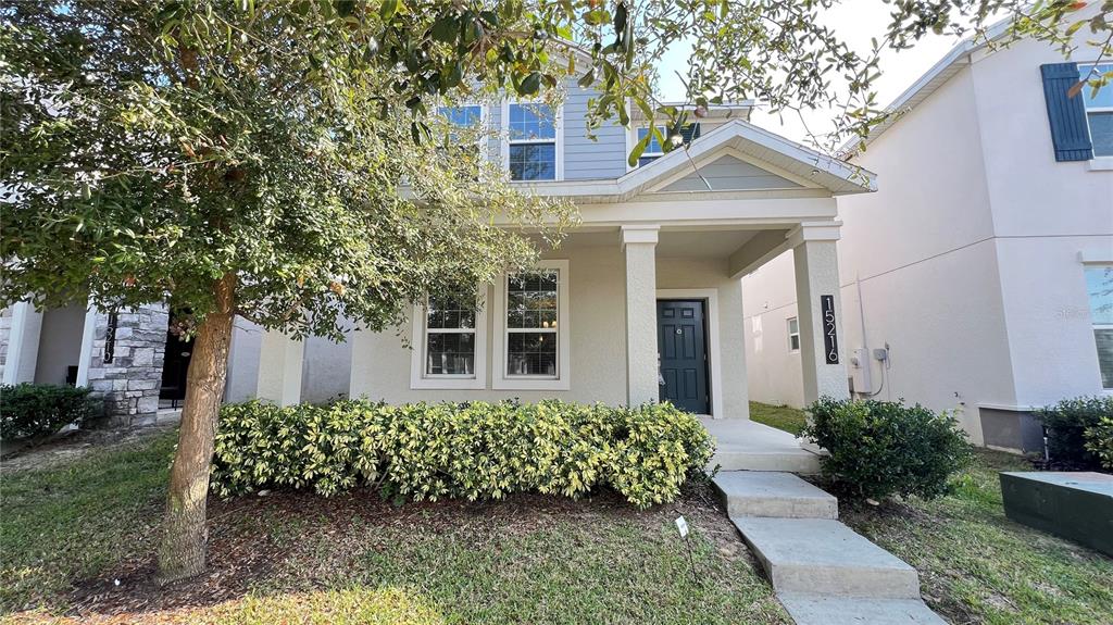 15216 Chapter Way Winter Garden, FL 34787 - Photo 2 of 53 a front view of a house with a yard