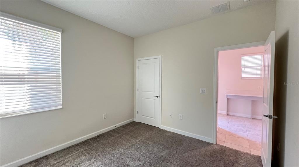 15216 Chapter Way Winter Garden, FL 34787 - Photo 32 of 53 an empty room with a window
