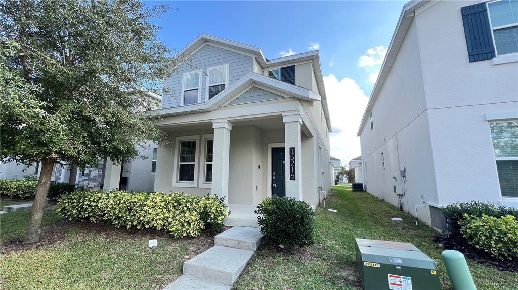 15216 Chapter Way Winter Garden, FL 34787 - Photo 4 of 53 a front view of a house with a yard