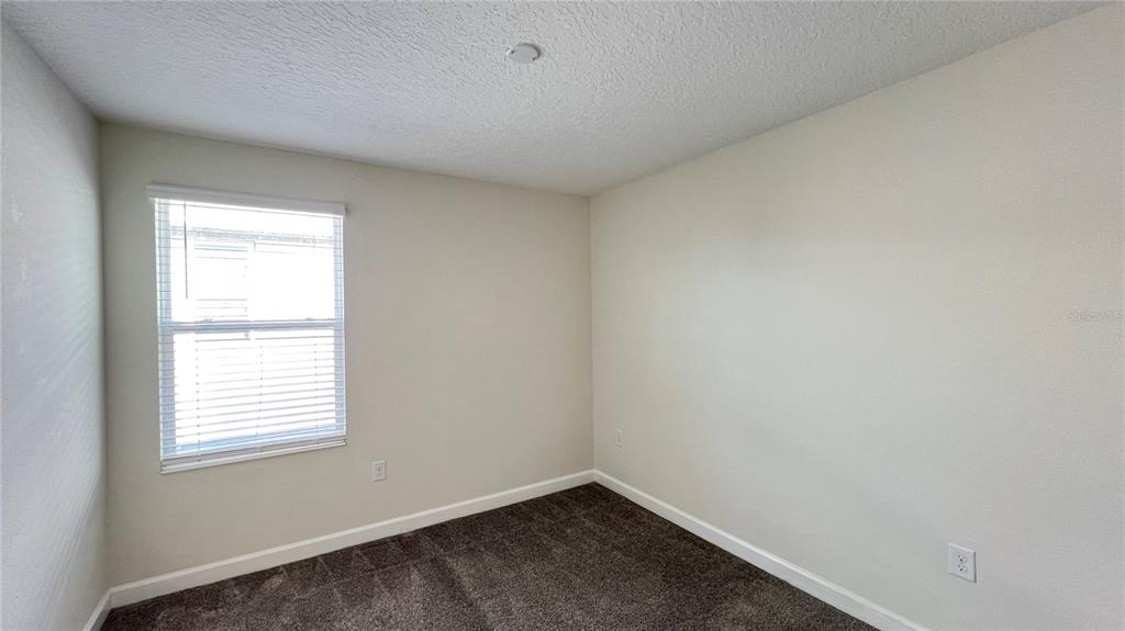 15216 Chapter Way Winter Garden, FL 34787 - Photo 45 of 53 an empty room with a window