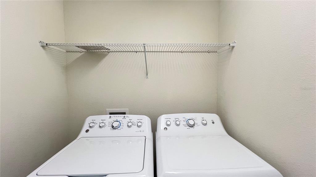 15216 Chapter Way Winter Garden, FL 34787 - Photo 46 of 53 a utility room with dryer and washer