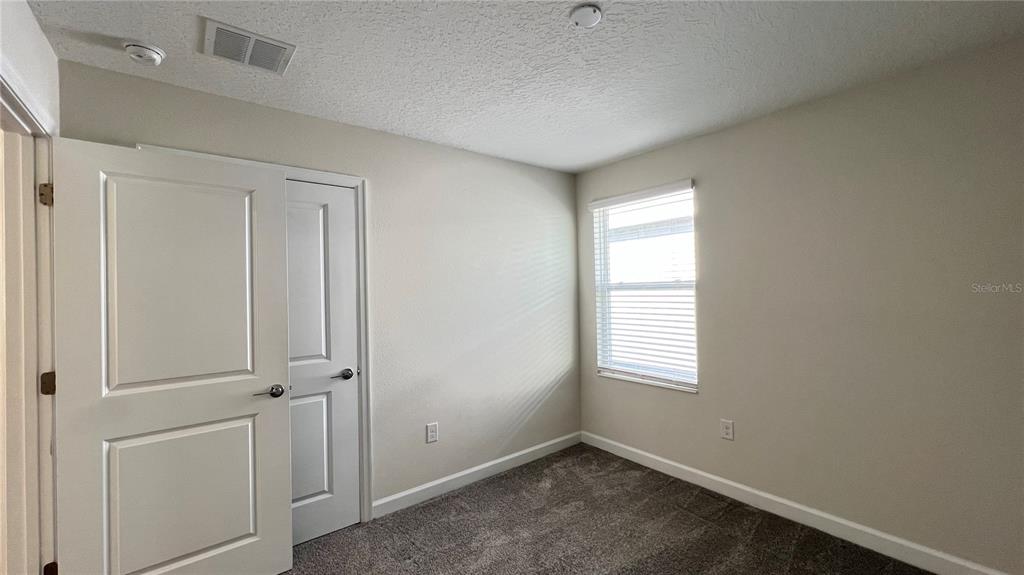 15216 Chapter Way Winter Garden, FL 34787 - Photo 50 of 53 a view of an empty room and window