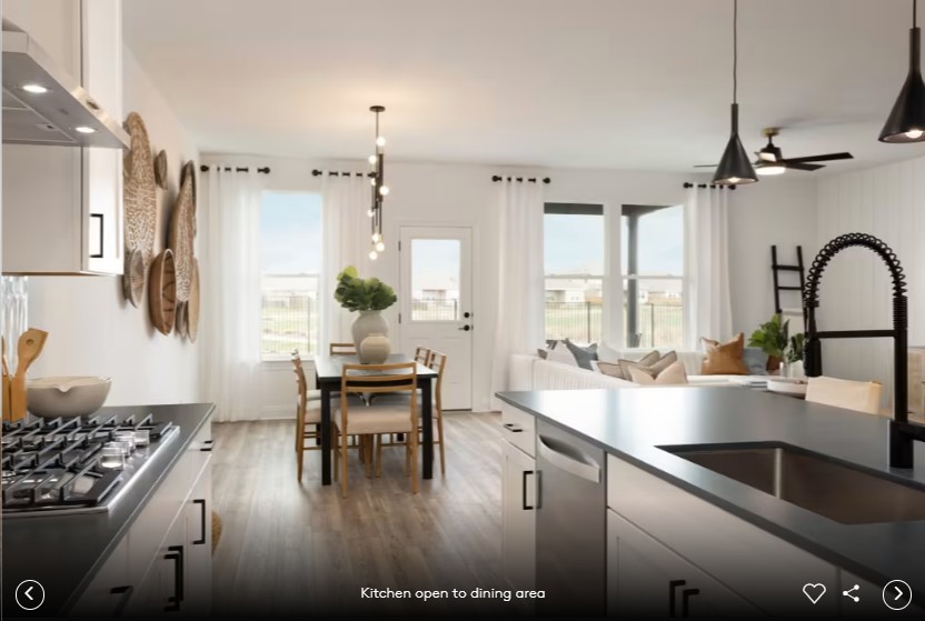 16809 Catemaco Walk Manor, TX 78653 - Photo 11 of 11 a kitchen with stainless steel appliances granite countertop a sink stove and refrigerator