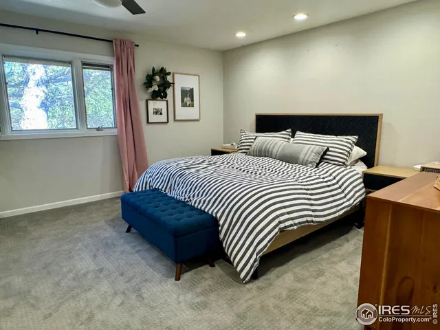 a view of room with furniture and a window