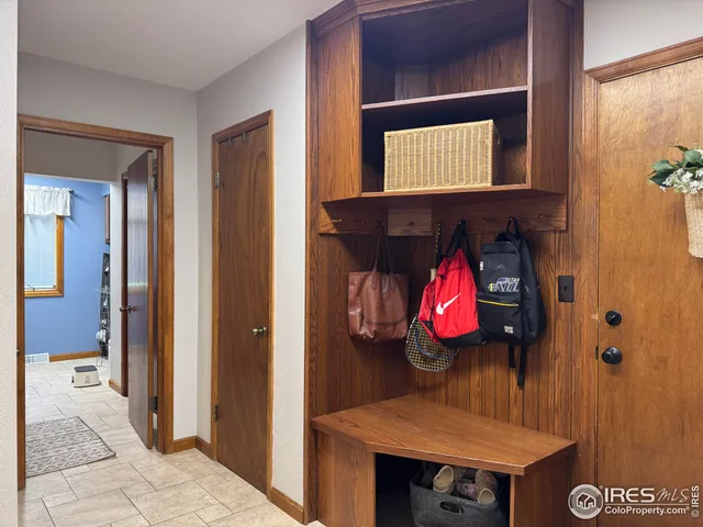 a bathroom with a sink toilet and mirror
