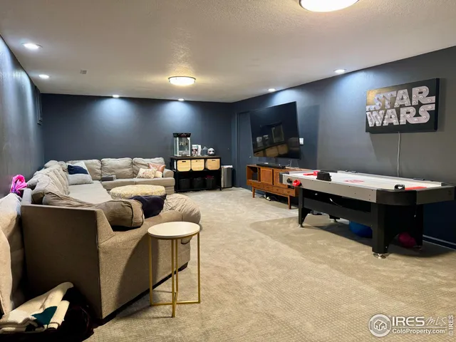 a room with furniture and a projector