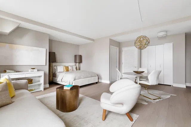 a living room with furniture large window and flat screen tv