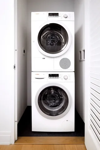 a bathroom with a sink toilet a mirror and shower
